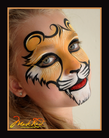 blonde girl with a lion's face masked painted on her